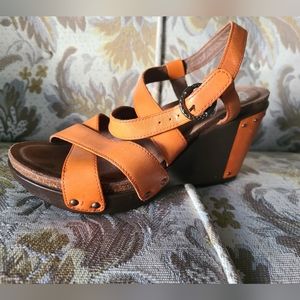 Dansko orange leather sandals, wedge heel European size 38.
